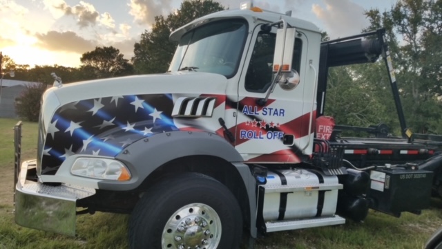 white truck with flag design